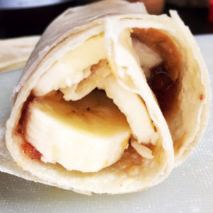 peanut butter and jelly wrap with bananas